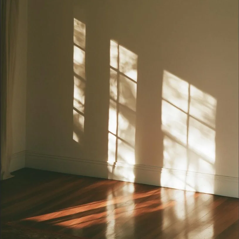 Morning light falling across an empty room